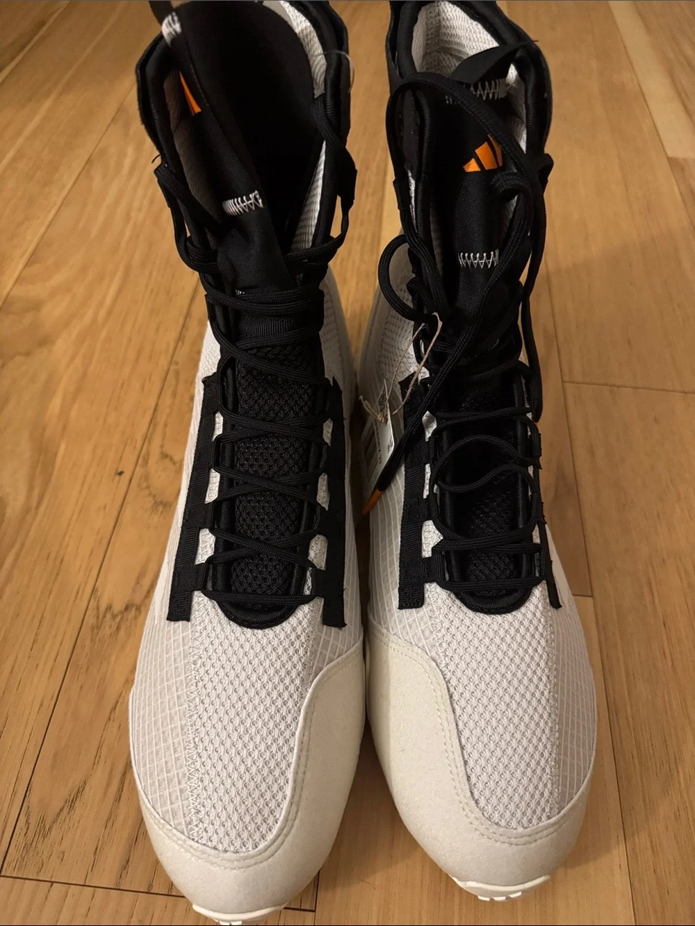 adidas Men's White and Black High-Top Athletic Shoes with Orange Accents